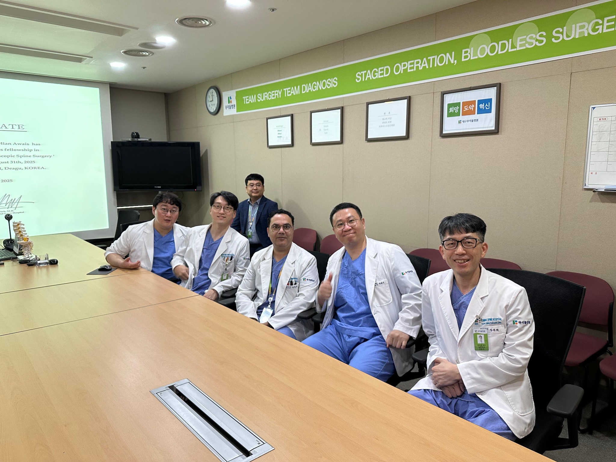 Dr. Mian Awais international spine surgery training in Korea